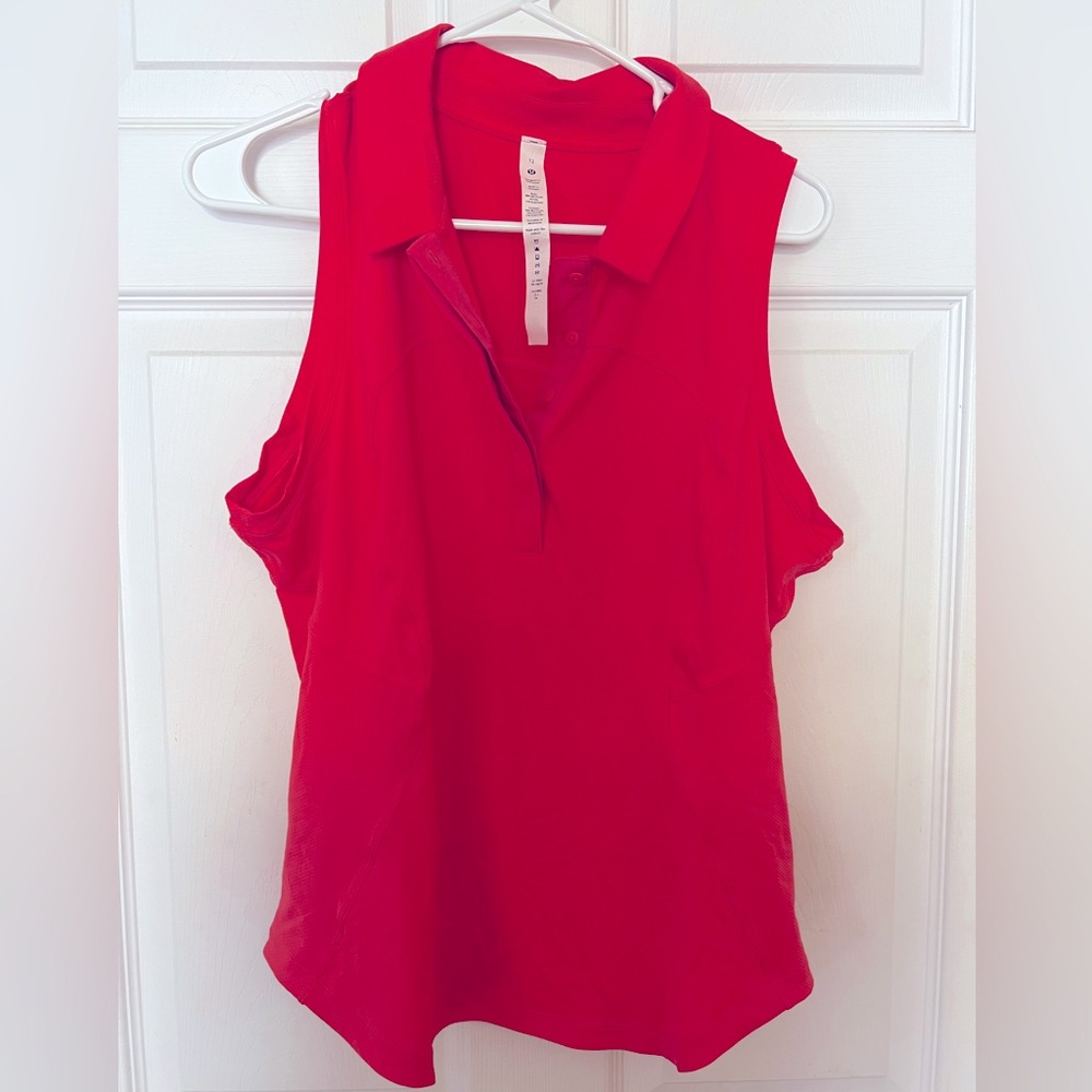 Sleeveless pink Lululemon polo.  Used size 12